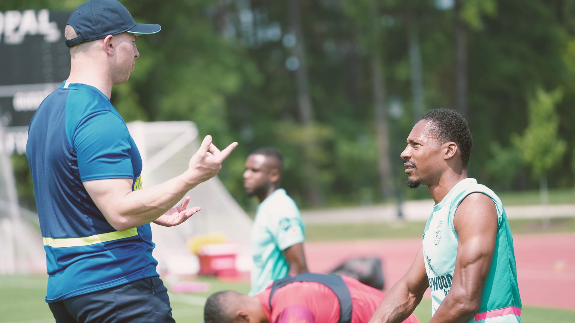 Ethan Pinnock in conversation with senior strength and conditioning coach Tom Perryman